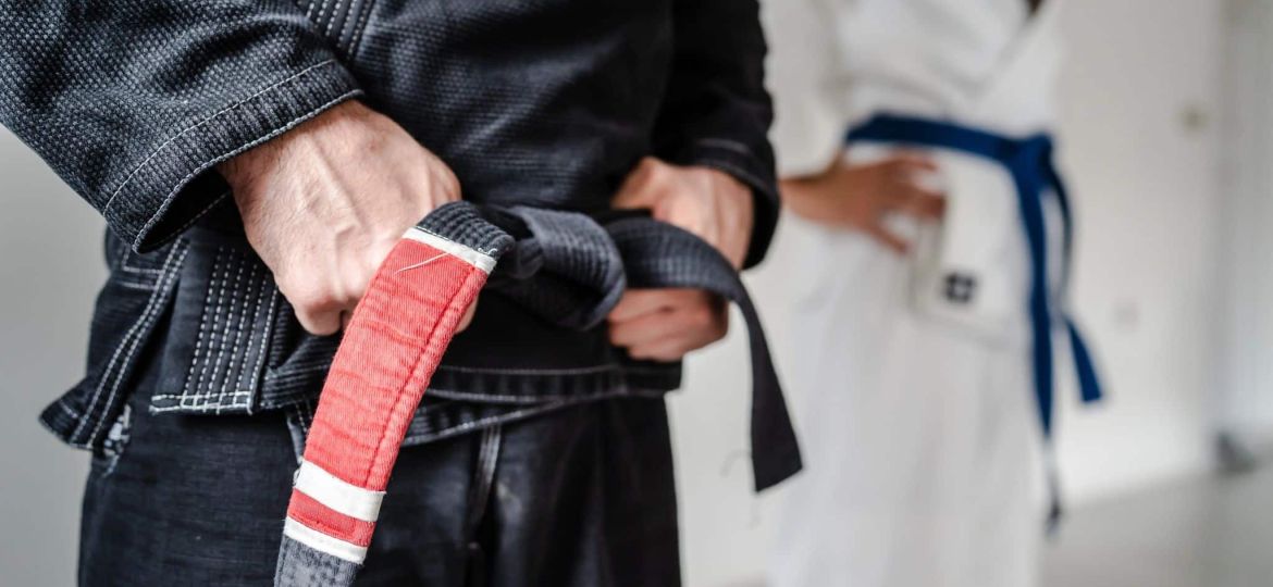 Men with suit and belt for Brazilian Jiu-Jitsu